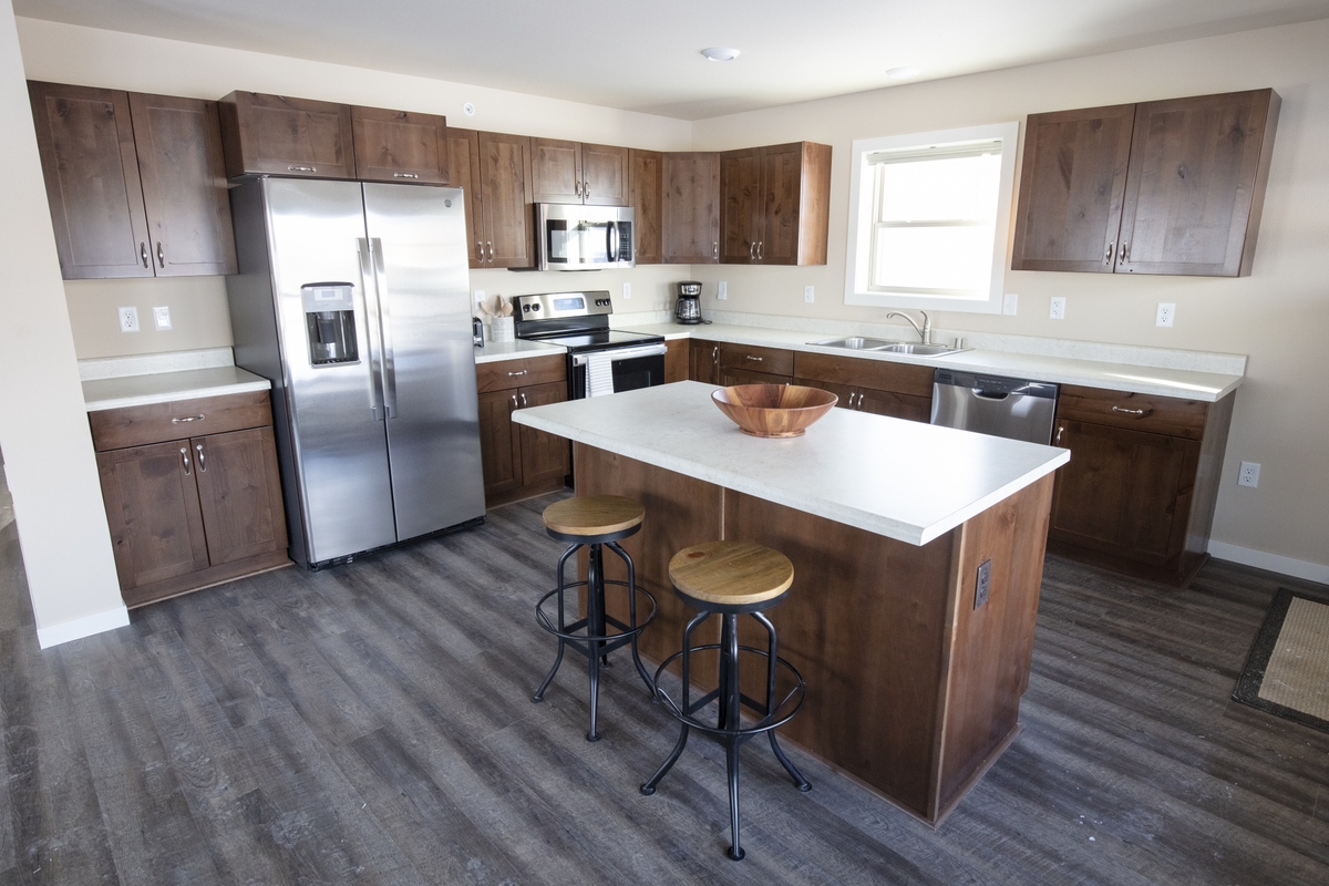 Kitchen layout inside new two-bedroom seasonal housing unit. Original public domain image from Flickr